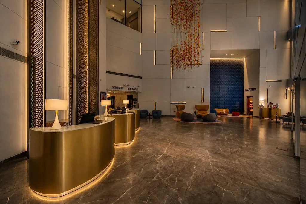 Gold reception desk and lobby of Luxury SPA in Millennium Central Downtown